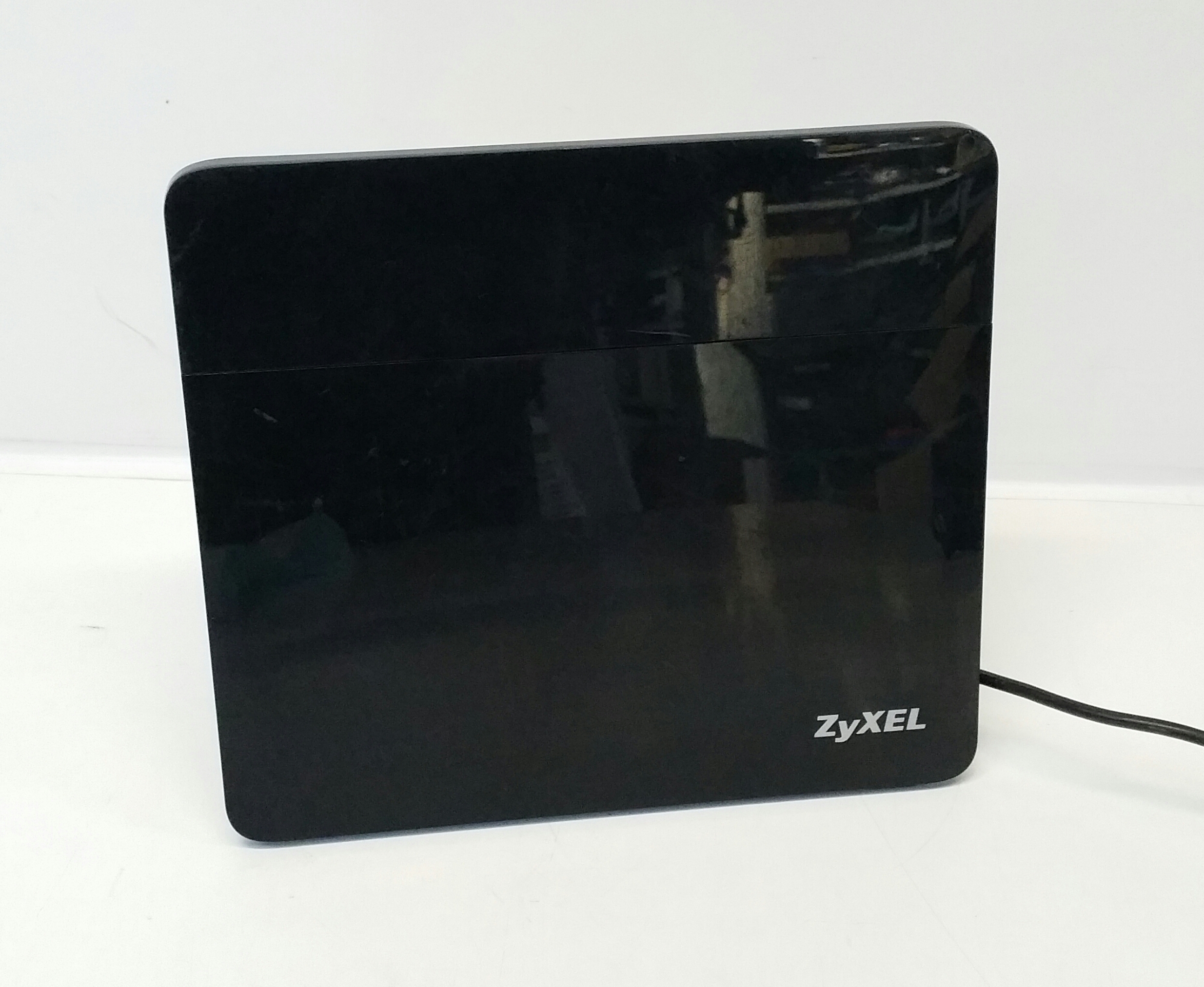 20231003_141659-1 ZyXEL VMG8924-B10A Wireless Router - No Power Supply and No Stand - Image 1